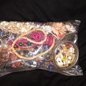 Mystery bag of mixed jewelry.